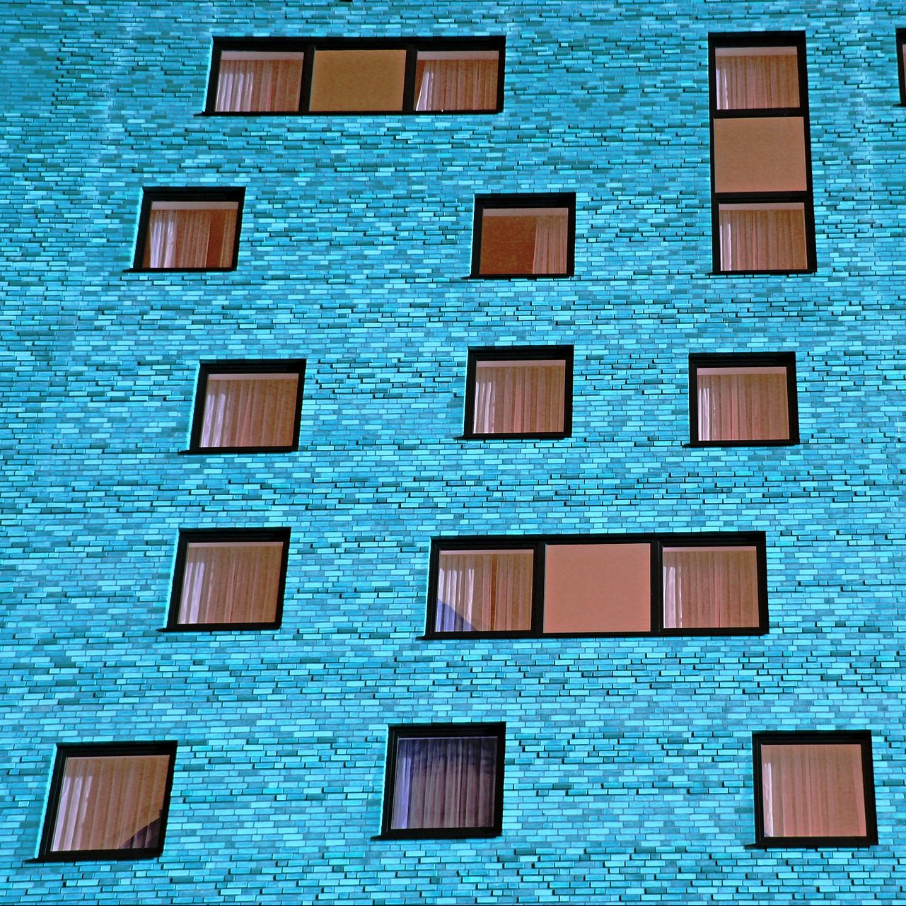 Colorful house with windows arranged in different directions