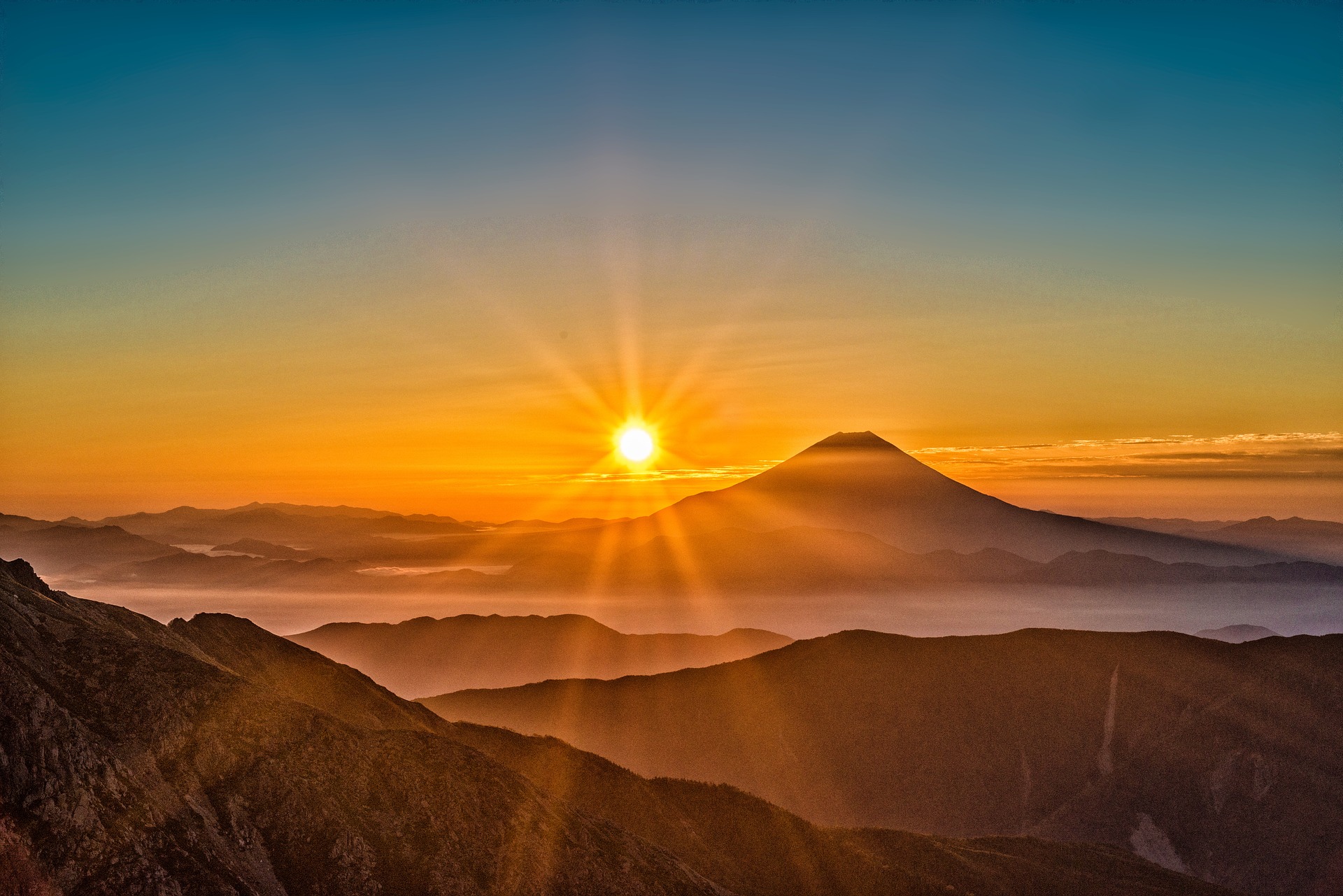 Sun rising over Mount Fuji