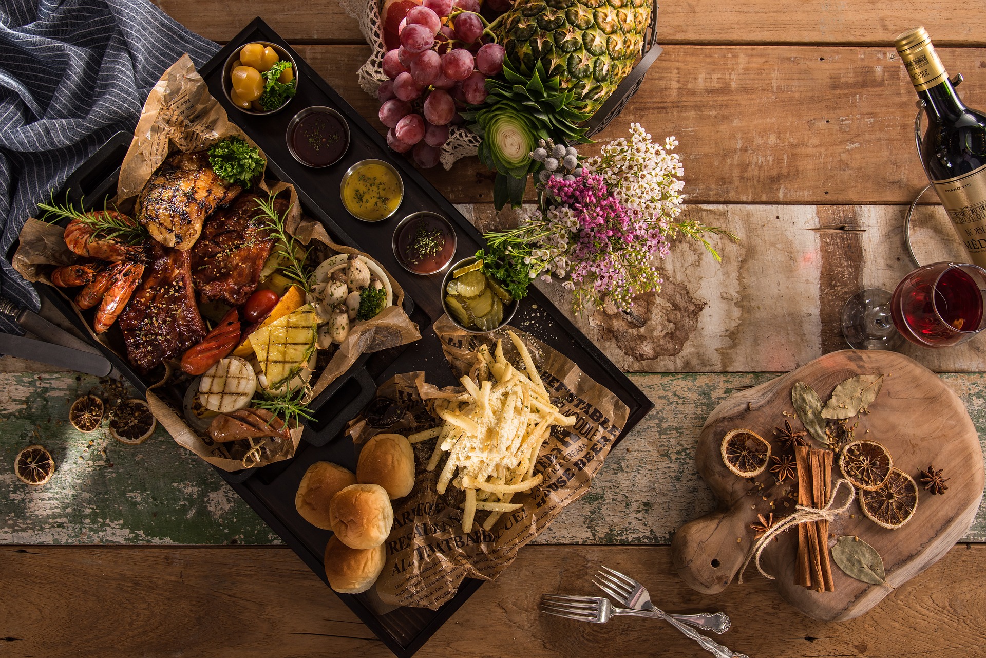 table top decoratively arranged with a platter of food