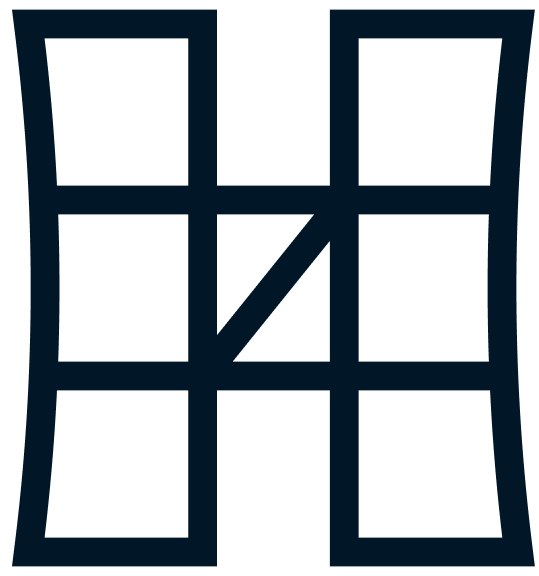 Dark H logo made out of building blocks.