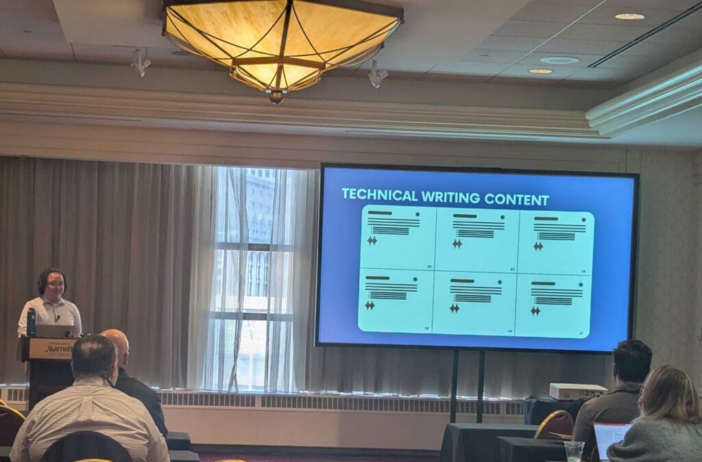 The same presenter from Image 2 stands at a Marriott-branded podium in a hotel conference room. A large screen displays a blue slide titled "TECHNICAL WRITING CONTENT" showing a grid of six teal-colored document template cards, each with text lines and sparkle icons, labeled with language codes including EN, FR, DE, CN, and JP. Several attendees are seated in red banquet chairs facing the screen.